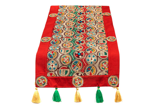 Runner with multicolor circle embroidery.