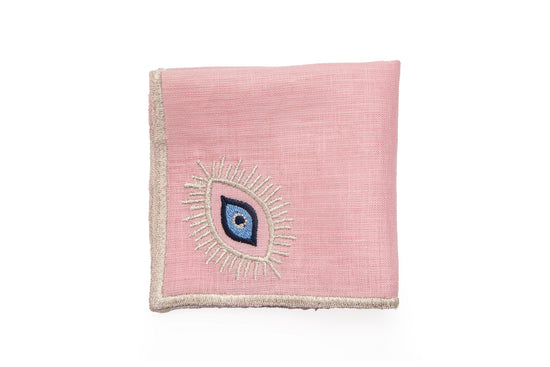 Pink linen cocktail napkins with embroidered evil eye.