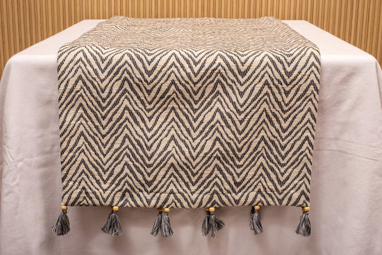 Herringbone blue and cream linen runner with tassels.