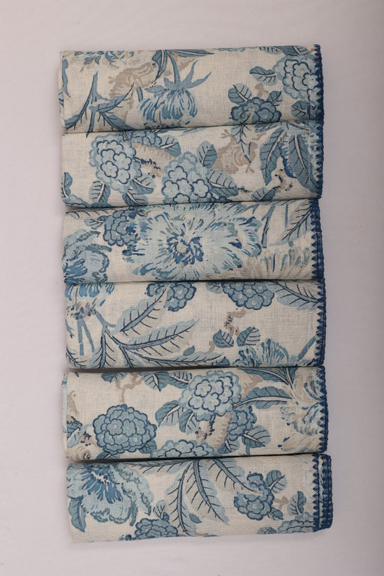 White linen blue leaves printed cocktail napkin.