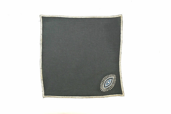 Charcoal grey linen cocktail napkins with silver evil eye embroidered.