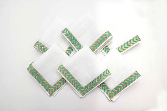 Turquoise block print linen cocktail napkins.