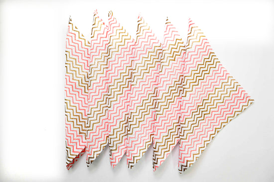 Pink chevron print linen cocktail napkins.