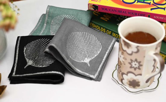 Silver printed linen cocktail napkins.