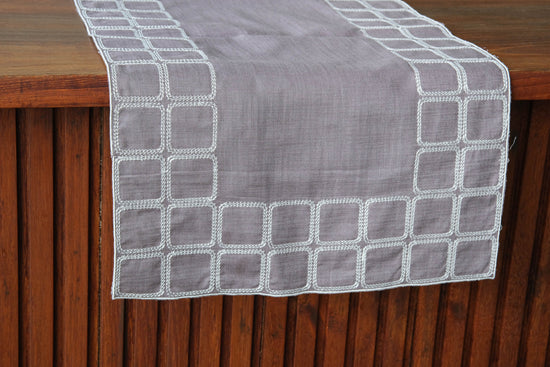 Grey linen runner with embroidery