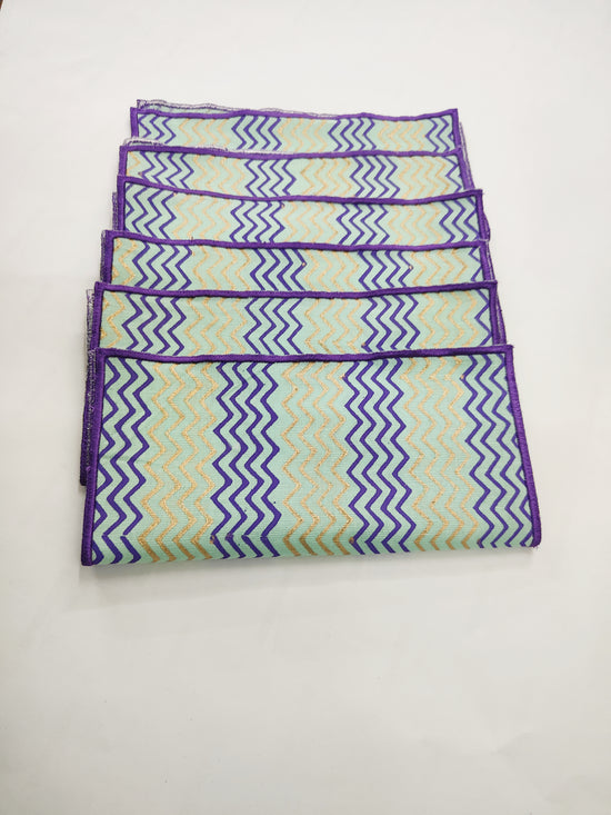 Natural linen cocktail napkin with chevron print.