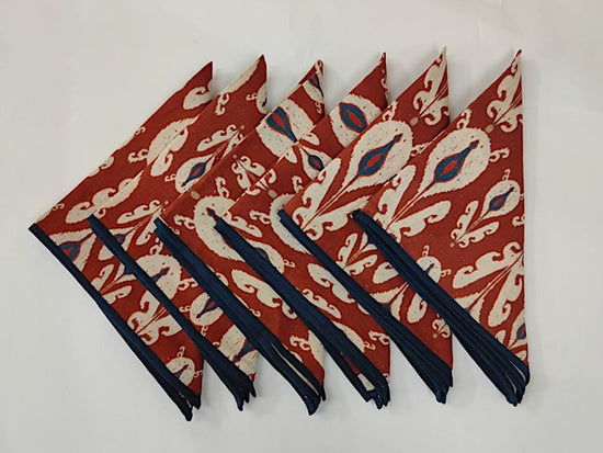 Maroon batic print linen dinner napkins.