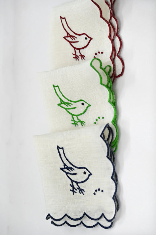 White linen cocktail napkin with bird embroidery
