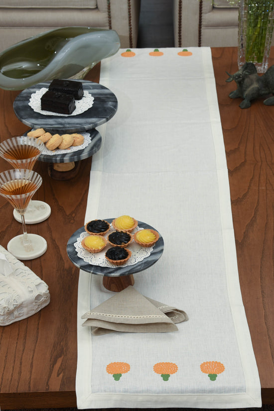 White linen runner with marigold embroidery with 3 motif