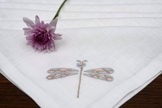 White linen cocktail napkins with dragon fly embroidery