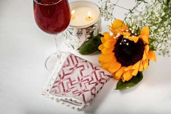 Wine coloured linen printed cocktail napkins.