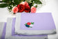 Purple cotton  dinner napkins with floral embroidery.