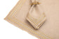 Natural linen placemats and  napkins with delicate  gold embroidery.