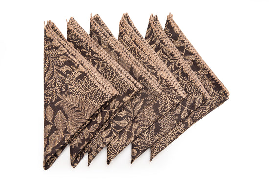 Black linen printed cocktail napkins with delicate embroidery.