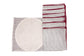 Striped linen placemats  with striped linen napkins.