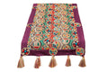 Runner with multicolor circle embroidery.