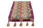 Runner with multicolor circle embroidery.
