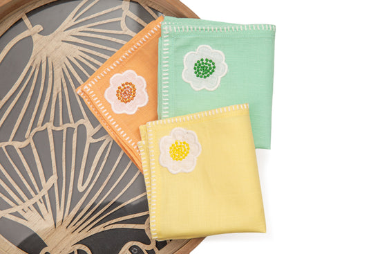Cocktail napkins with  appliqued  embroidery.