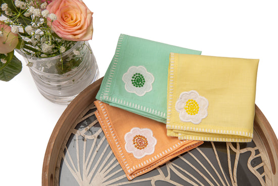 Cocktail napkins with  appliqued  embroidery.