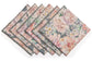 Slate green printed  linen dinner napkins with delicate embroidery.