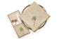 Striped linen dinner napkins with embroidery.