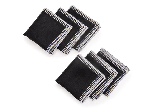 Black linen cocktail embroidered napkins .