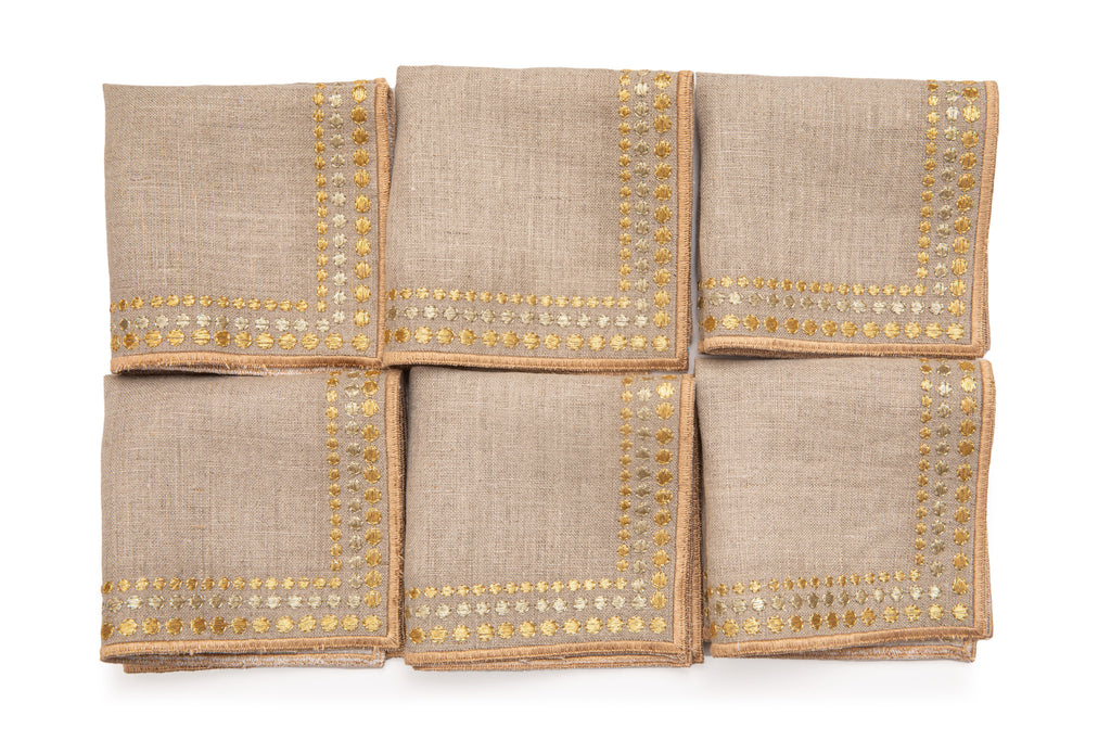 Natural linen cocktail napkins with delicate  gold embroidery.