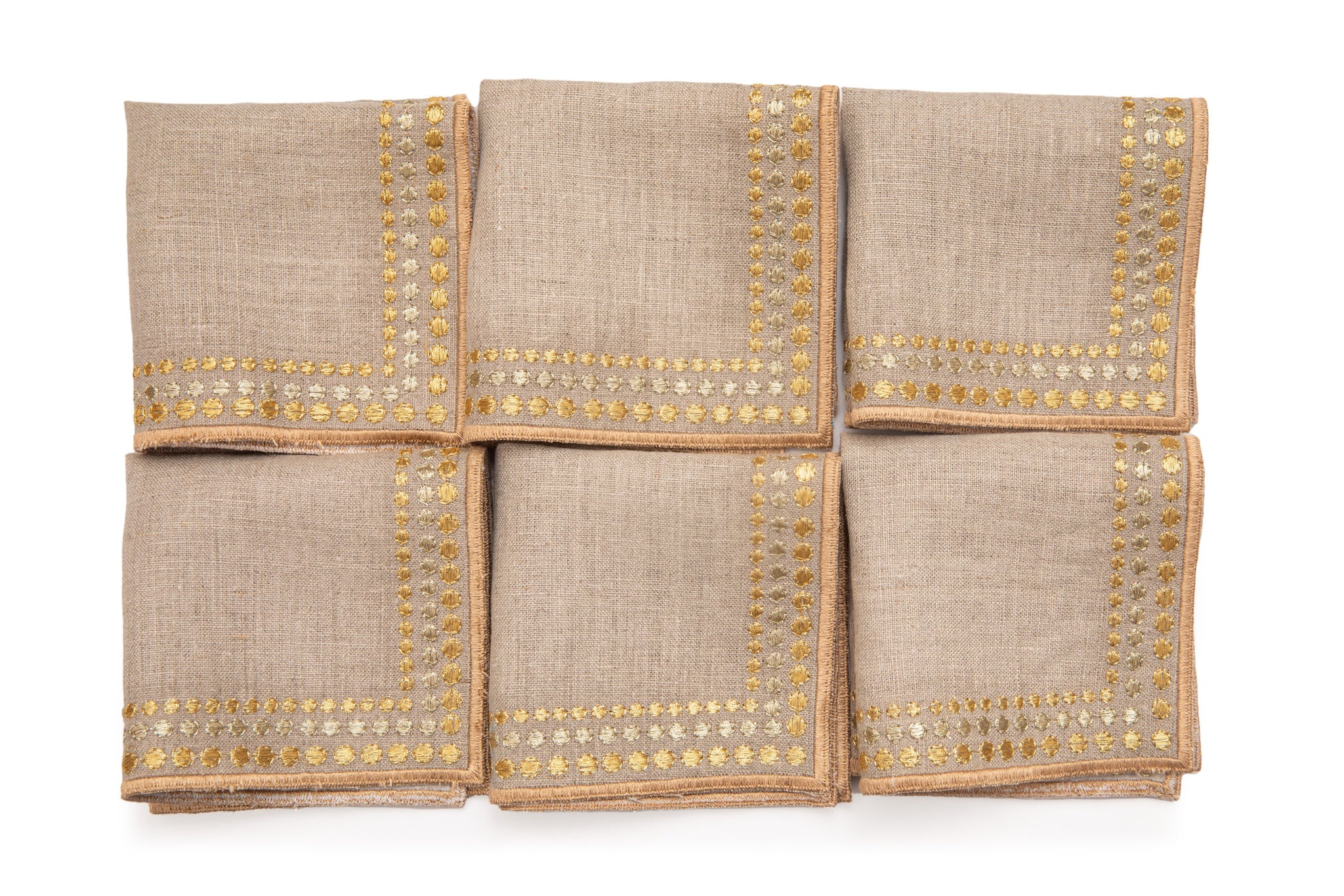 Natural linen cocktail napkins with delicate  gold embroidery.