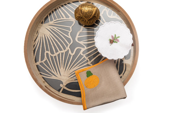 Natural linen cocktail napkins with  embroidered marigold.