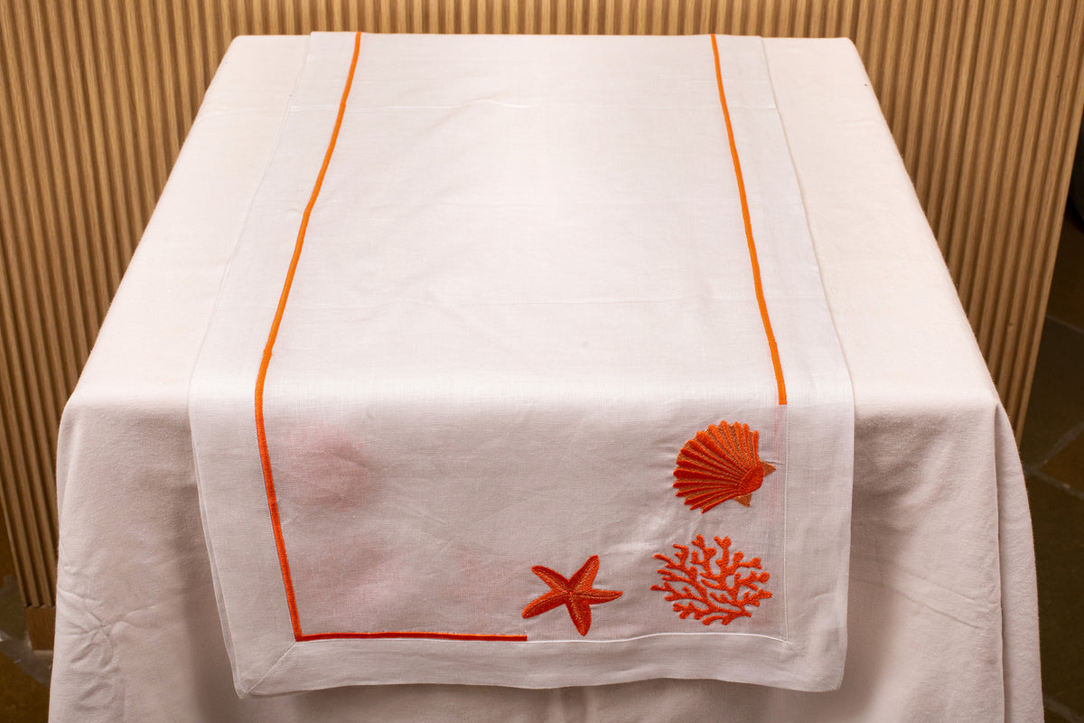White linen embroidered runner.