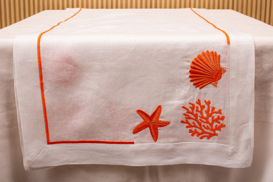 White linen embroidered runner.