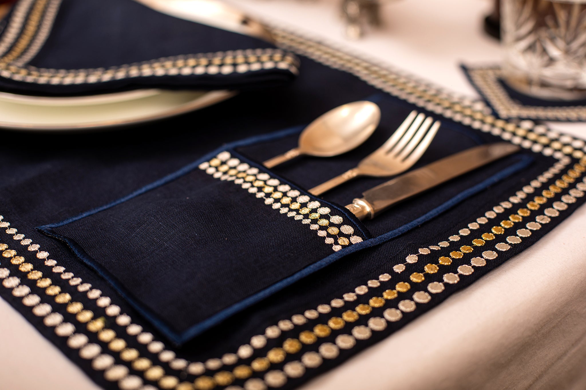 Navy blue linen silver embroidered  cutlery holder.