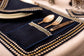Navy blue linen silver embroidered  cutlery holder.