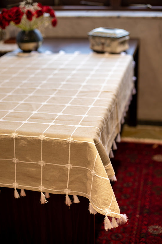 Embroidered linen table cloth.