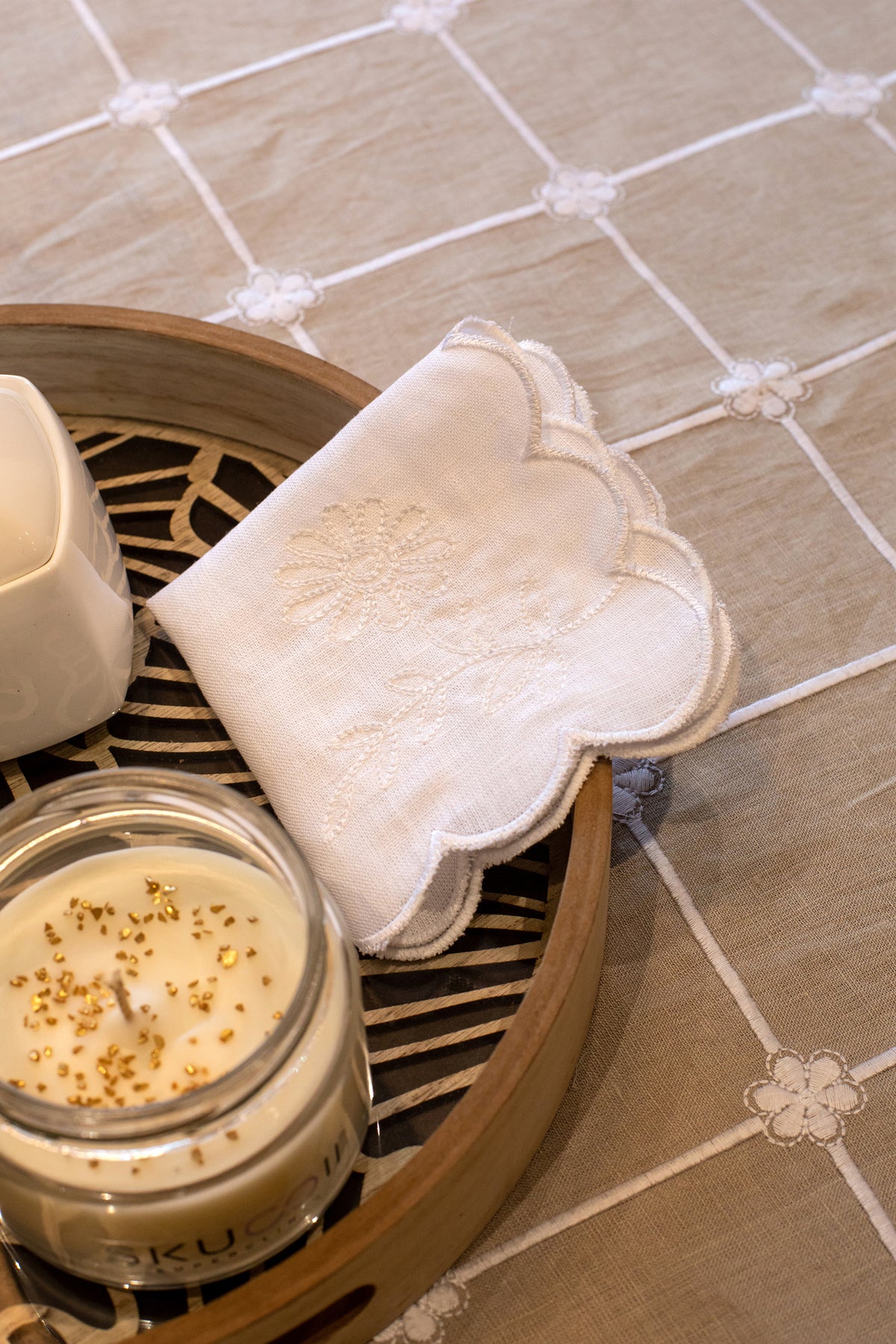 Embroidered linen table cloth.