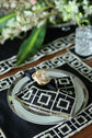 Black linen embroidered runner.