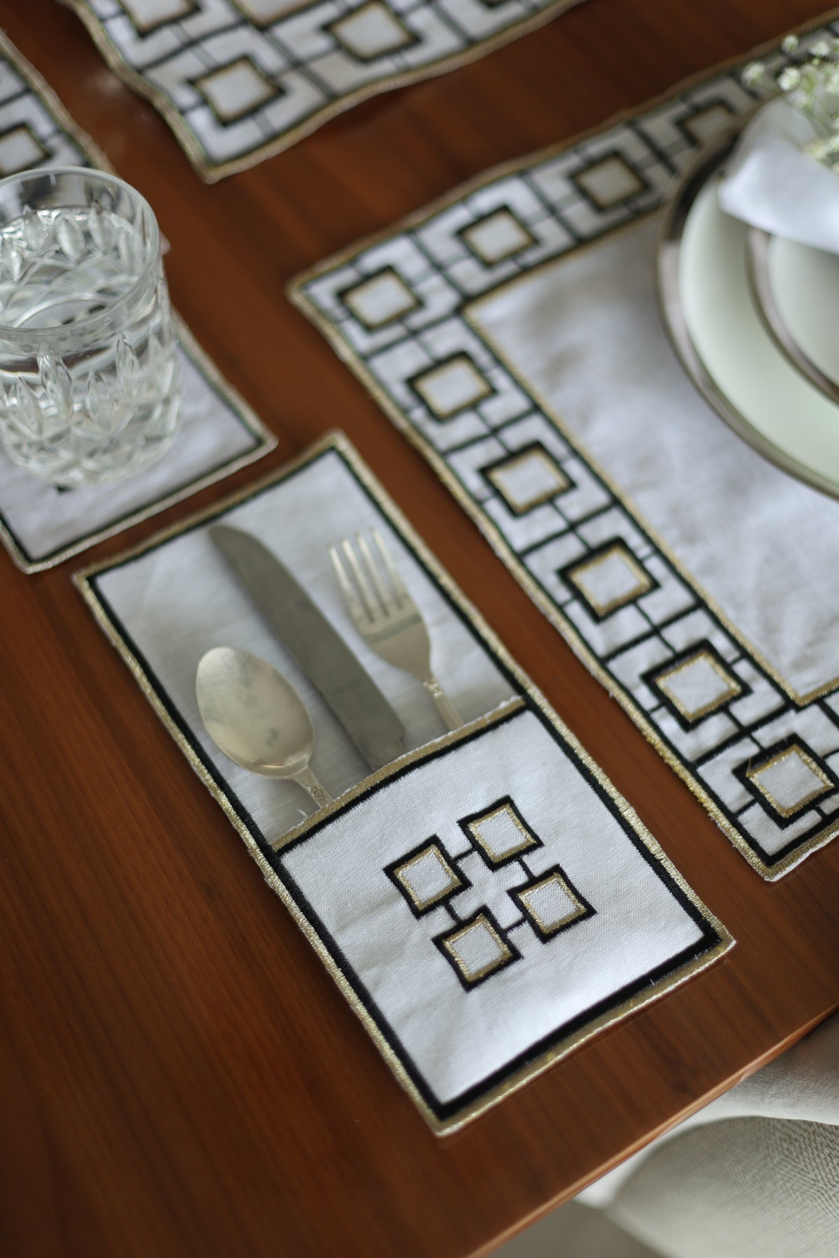 White linen embroidered coaster.