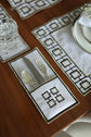 White linen embroidered coaster.