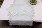 Powder blue linen silver cutwork runner.
