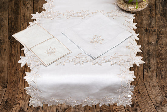 Powder blue linen silver cutwork runner.