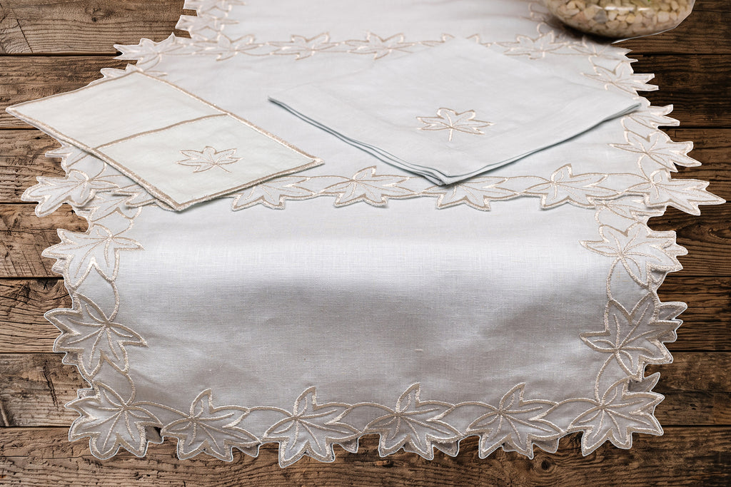 Powder blue linen silver cutwork runner.