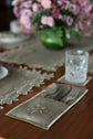 Brown linen gold maple leaf cutlery holder.