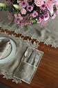 Brown linen placemats and napkins with gold  cutwork embroidery.