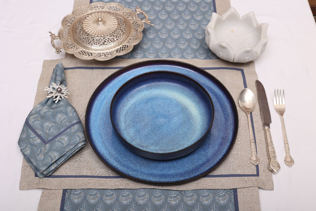 Blue linen peacock print runner with flange.