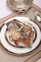 Natural linen embroidered placemats and printed linen napkin.