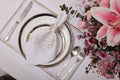 White linen placemats and napkins with gold hydrangea.