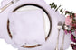 White linen placemat and napkin embroidered.