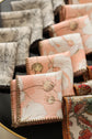 Peach linen white floral printed cocktail napkin.