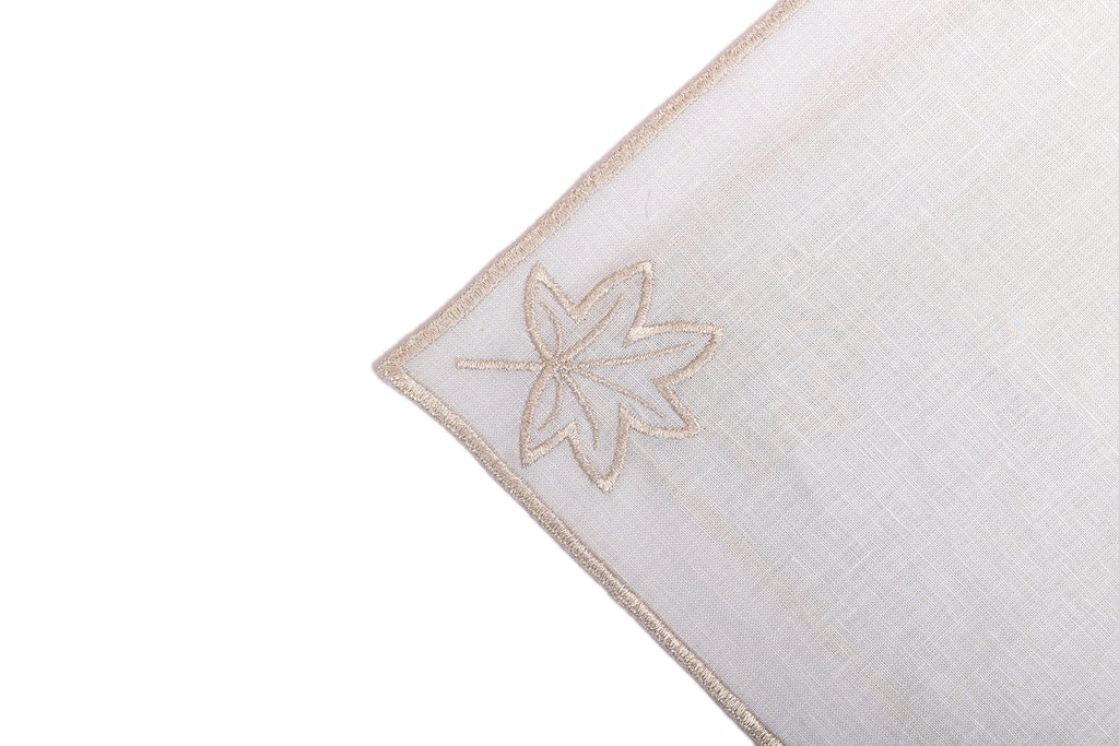 Powder blue linen silver maple leaf embroidered cocktail napkin.