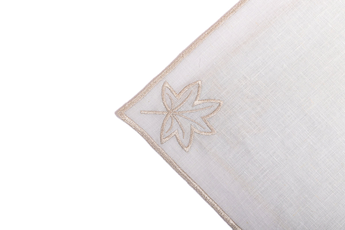 Powder blue linen silver maple leaf embroidered cocktail napkin.